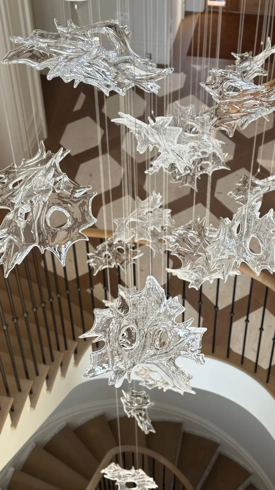 Bespoke suspended glass-sculpture installation over a staircase, by Chic Cocoon